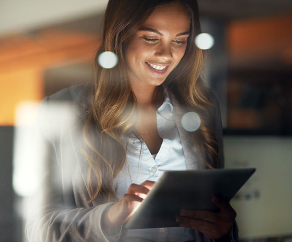 Lady using iPad in office